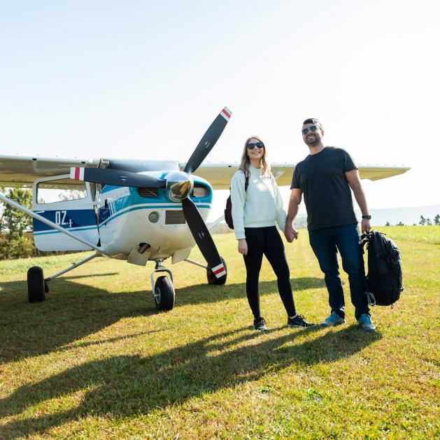Kallsy and Logan Page prepare to take off on an aerial adventure.