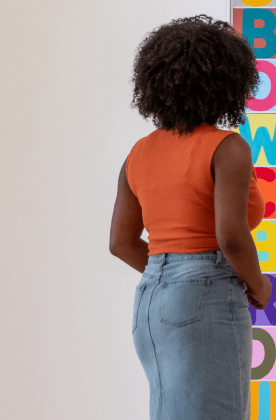 Woman looking at art in museum